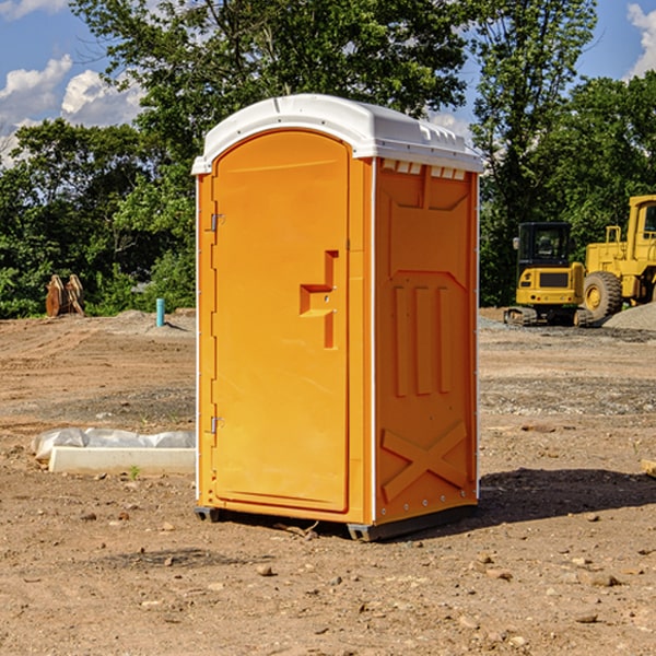 how often are the portable toilets cleaned and serviced during a rental period in Wauna